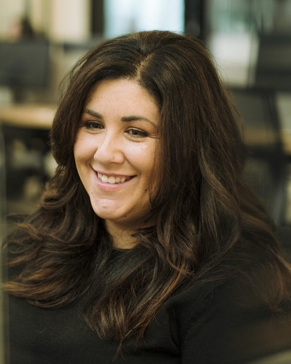 Amy Moore, Co-founder & Executive Creative Director at Lemonly, at her desk in the Sioux Falls studio